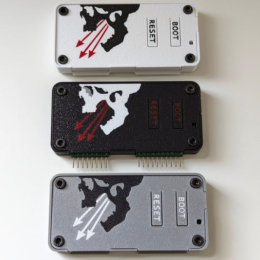 Three Flipper Zero Marauder WiFi Dev Board with a skull design on a white background