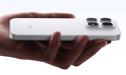 Hand holding a white Xiaomi 17 smartphone on a white background