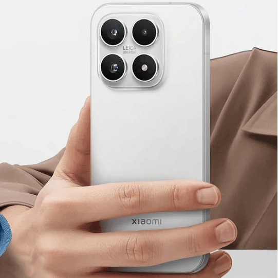 Hand holding a Xiaomi 17 smartphone with a white back and brown jacket background