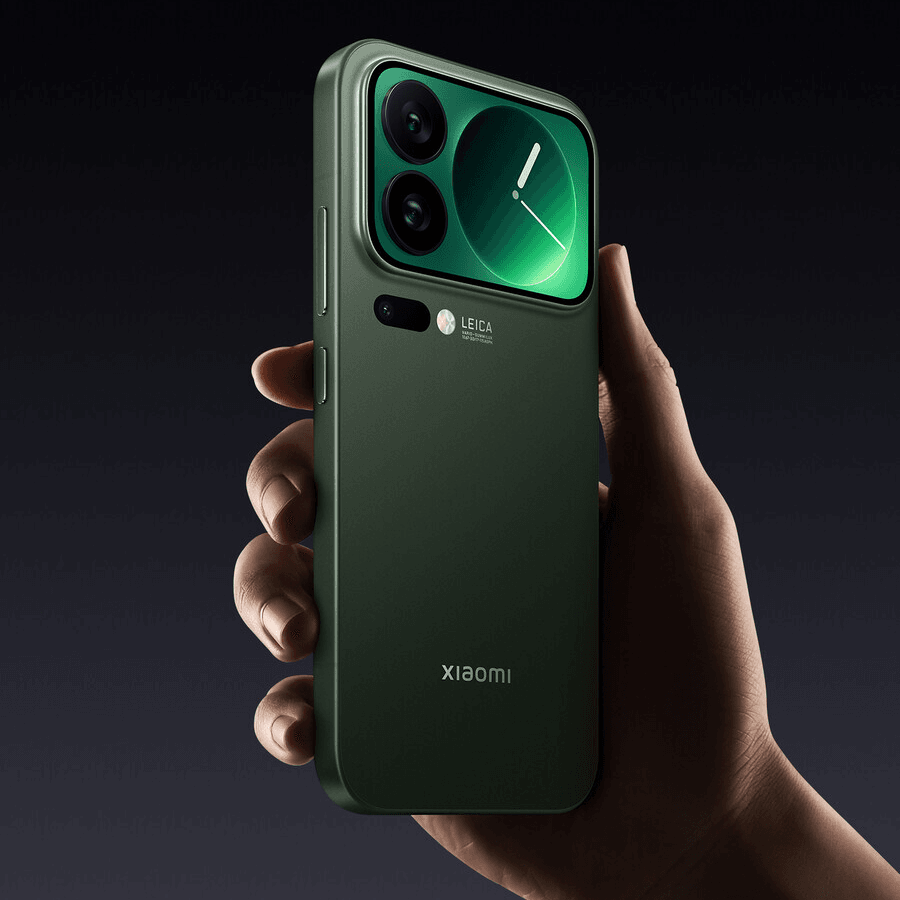 Green Xiaomi 17 Pro phone held in a hand with a dark background